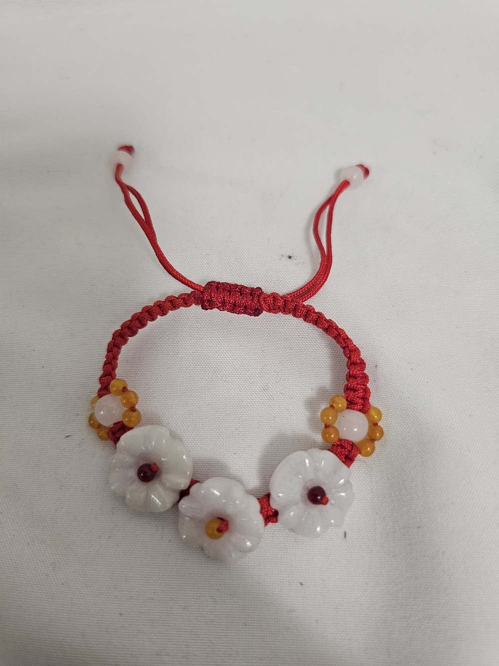Flower Jade With Red Cord Bracelet